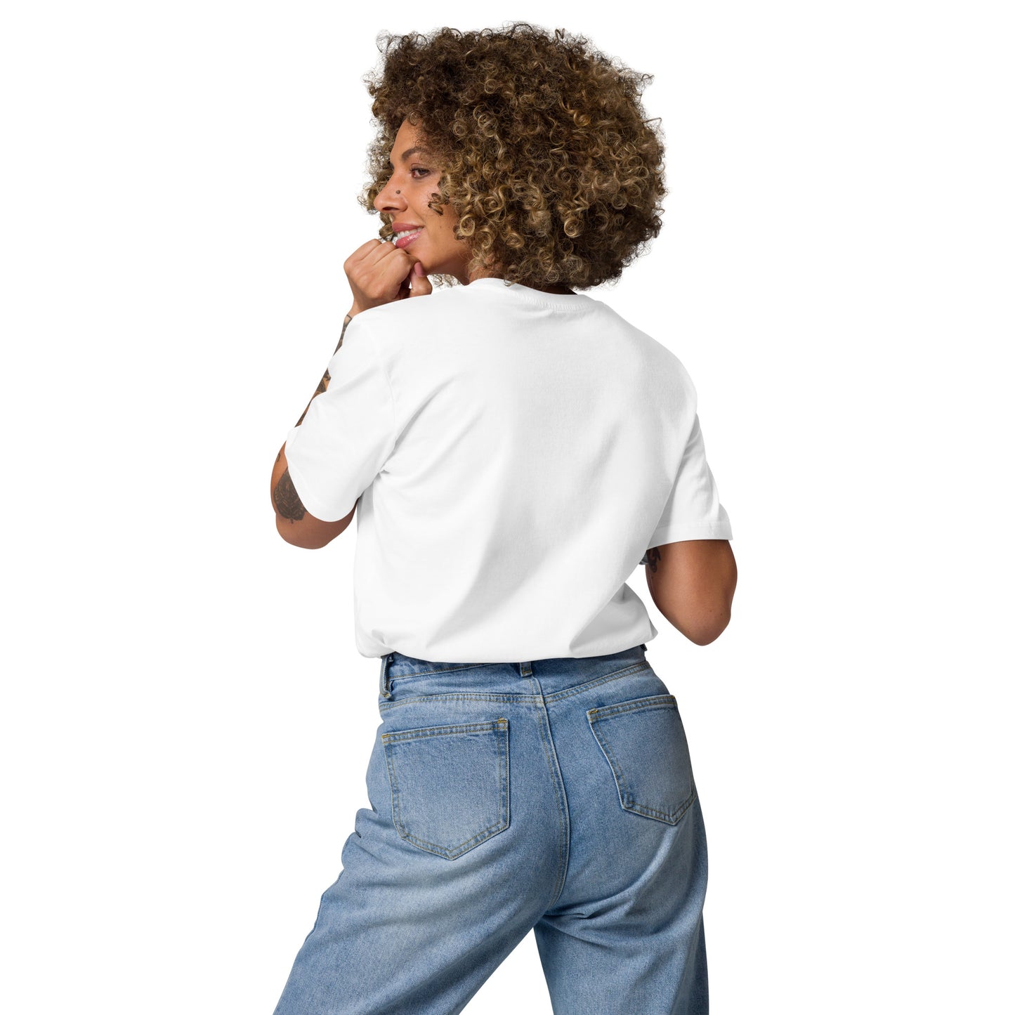Woman wearing white Edward Gorey Dracula Bat T-shirt and blue jeans, back view