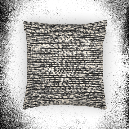 Edward Gorey inspired cushion with black and white textured grid pattern on white background