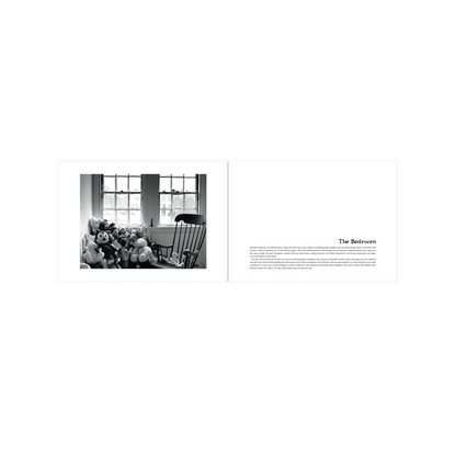 Edward Gorey bedroom black and white photo with plush toys, rocking chair, and window display