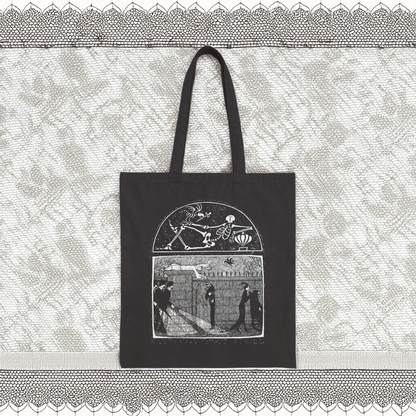 Edward Gorey black tote bag with gothic illustration, displayed on lace background