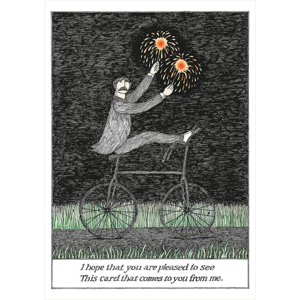 Edward Gorey birthday card with a man on a vintage bicycle holding sparklers at night