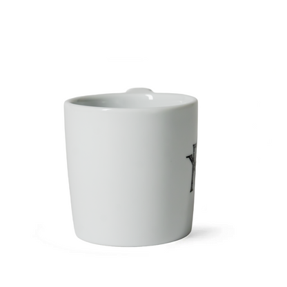 Minimalist white ceramic mug with partial black text, Edward Gorey Online Shop product