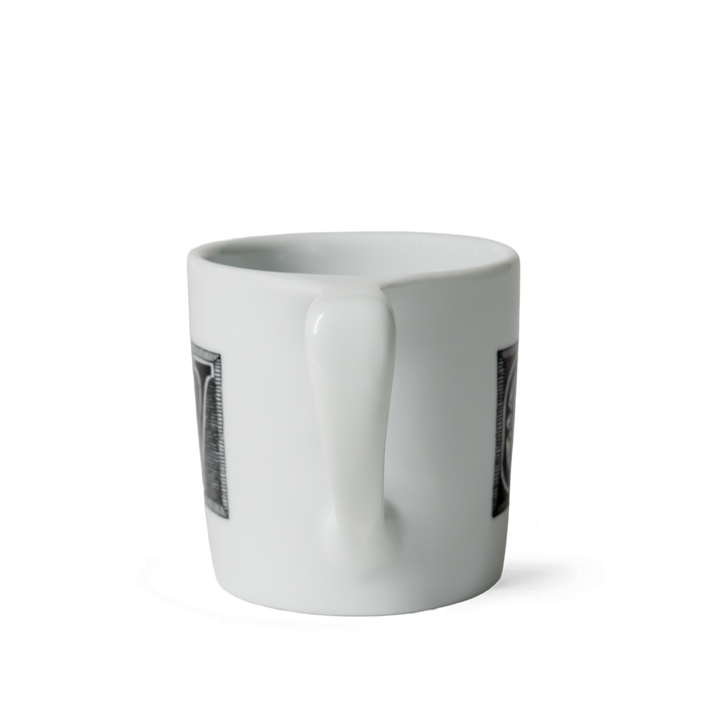 White ceramic Edward Gorey mug with black illustrations on sides, handle in center