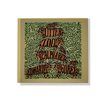 The Utter Zoo Alphabet book cover by Edward Gorey with whimsical animal design and green foliage.